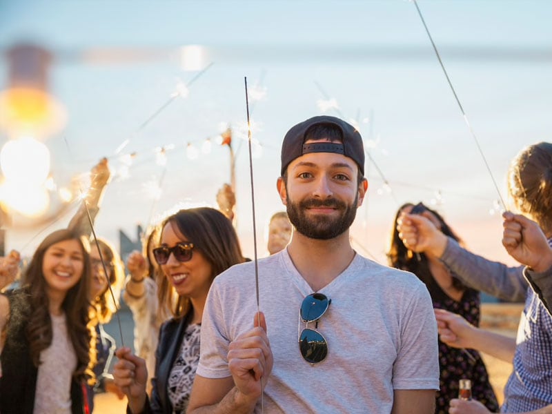 Man at festival with friends