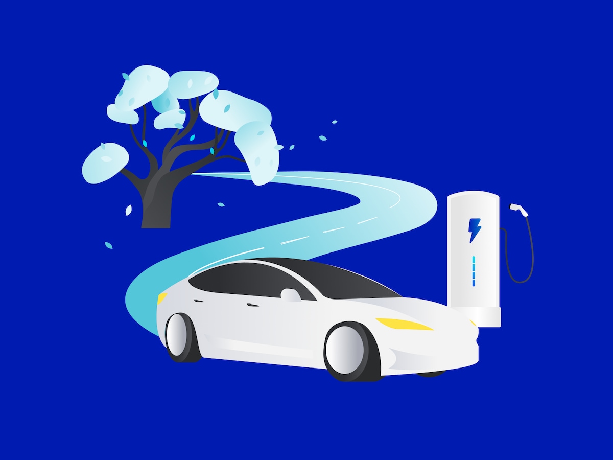 Person charging electric vehicle