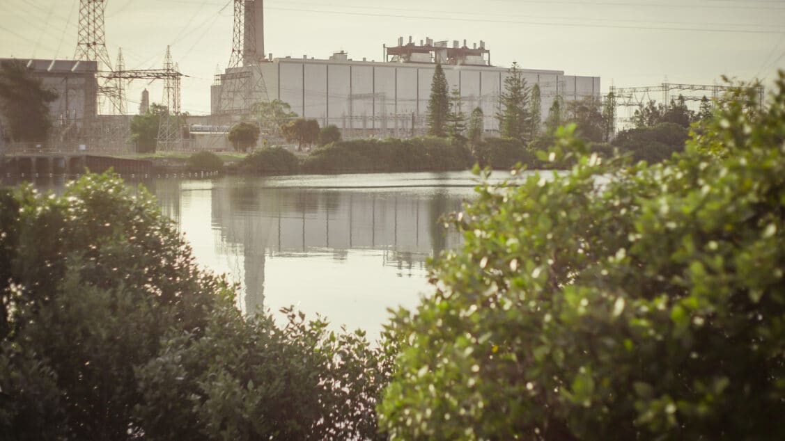 Photo of Torrens Island Power Station from across the lake