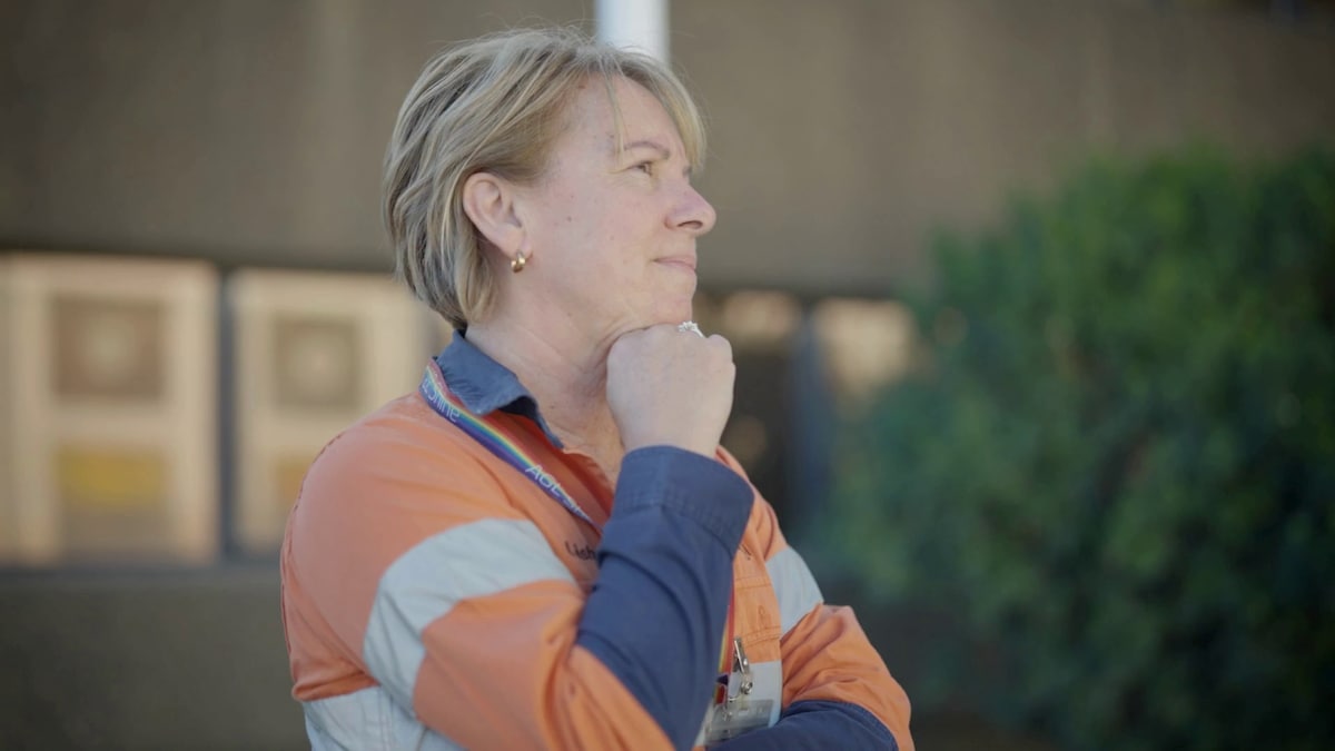 Photo of Leisha Williams in high vis jumper. 