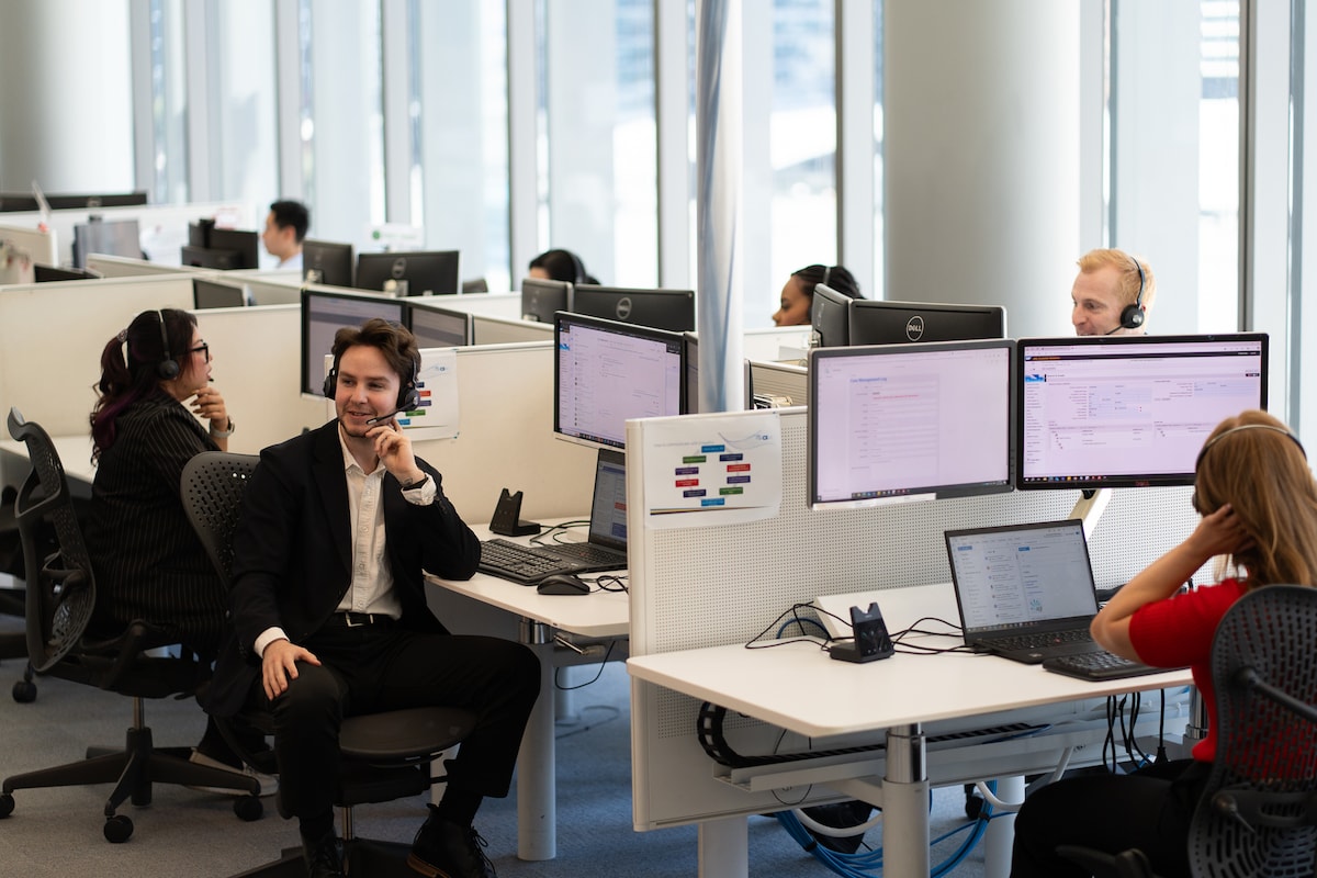 An on-the-job coaching session at one of our contact centres