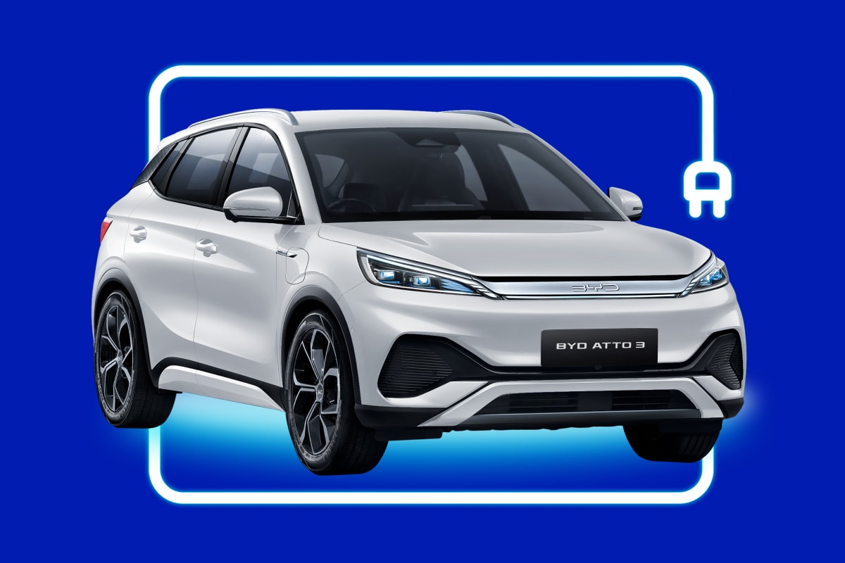 Mum and child on a laptop in the kitchen