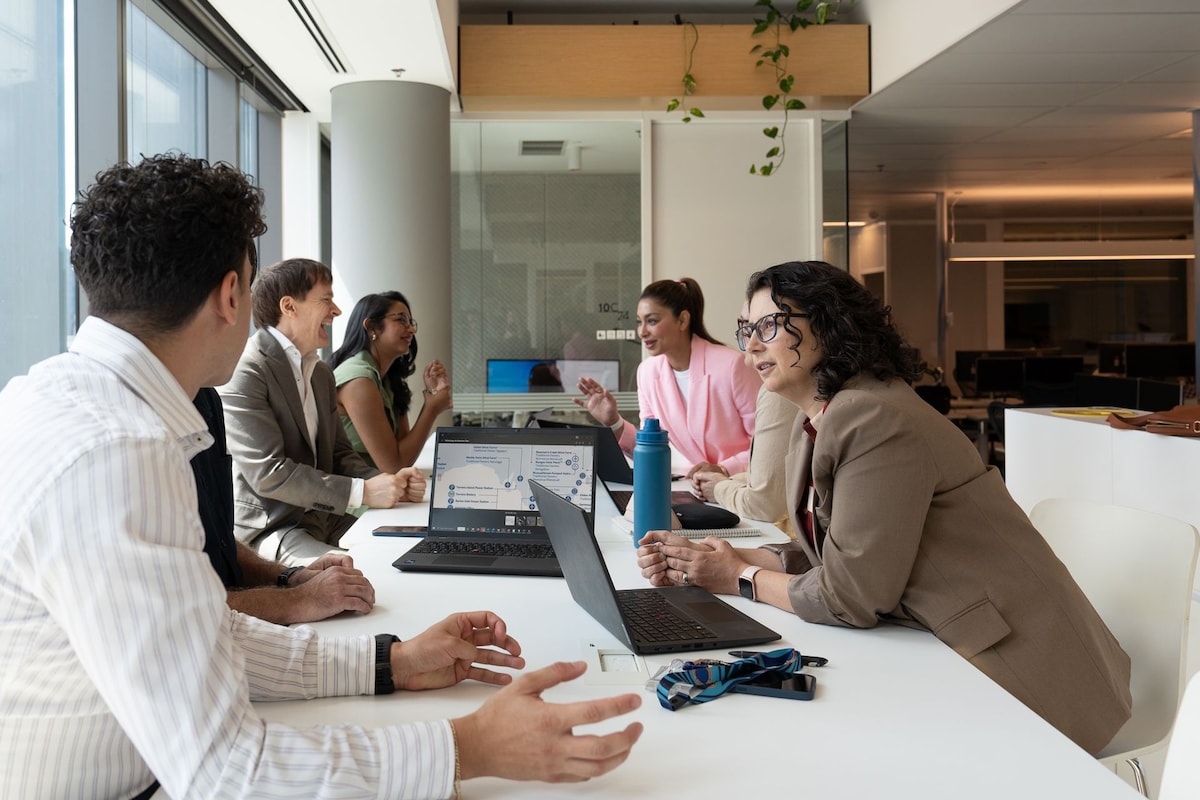agl team members in a meeting