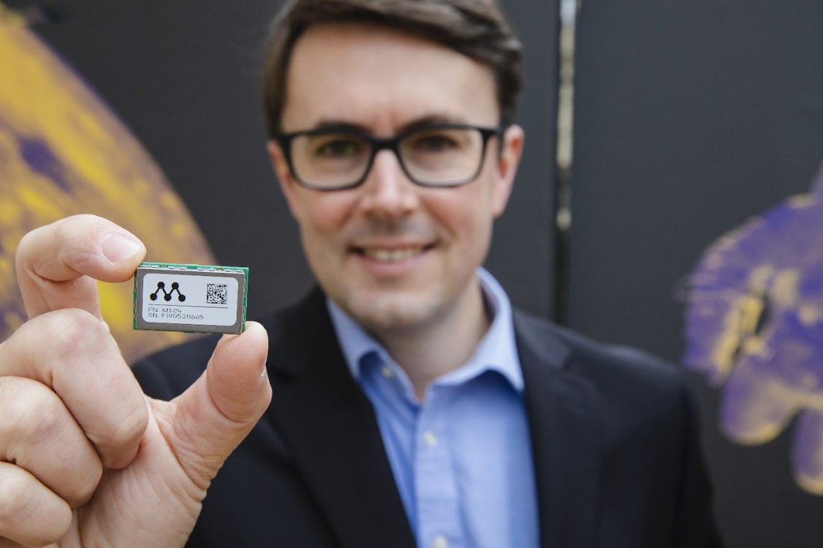 Dr Alex Grant with myriota module