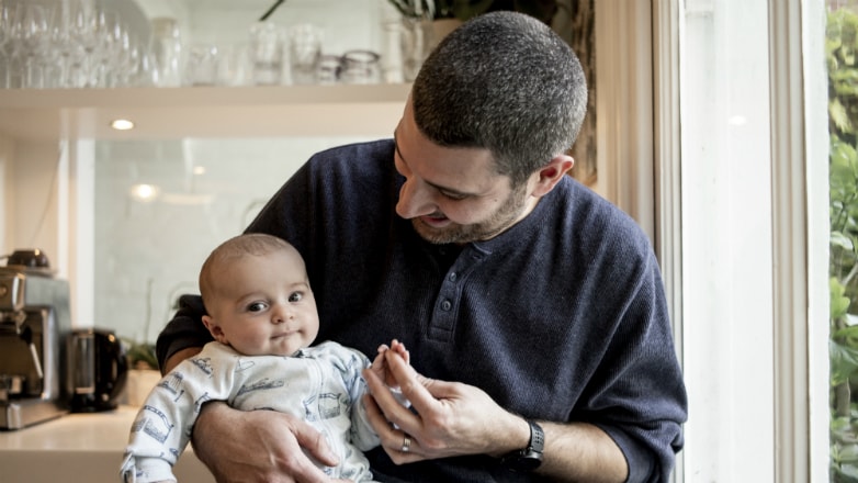 Man holding baby