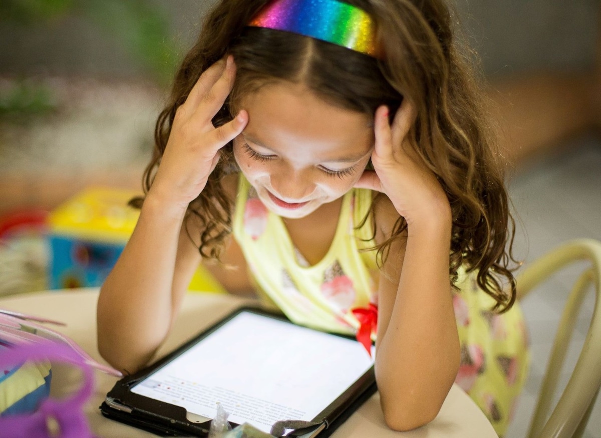 Girl reading on a tablet
