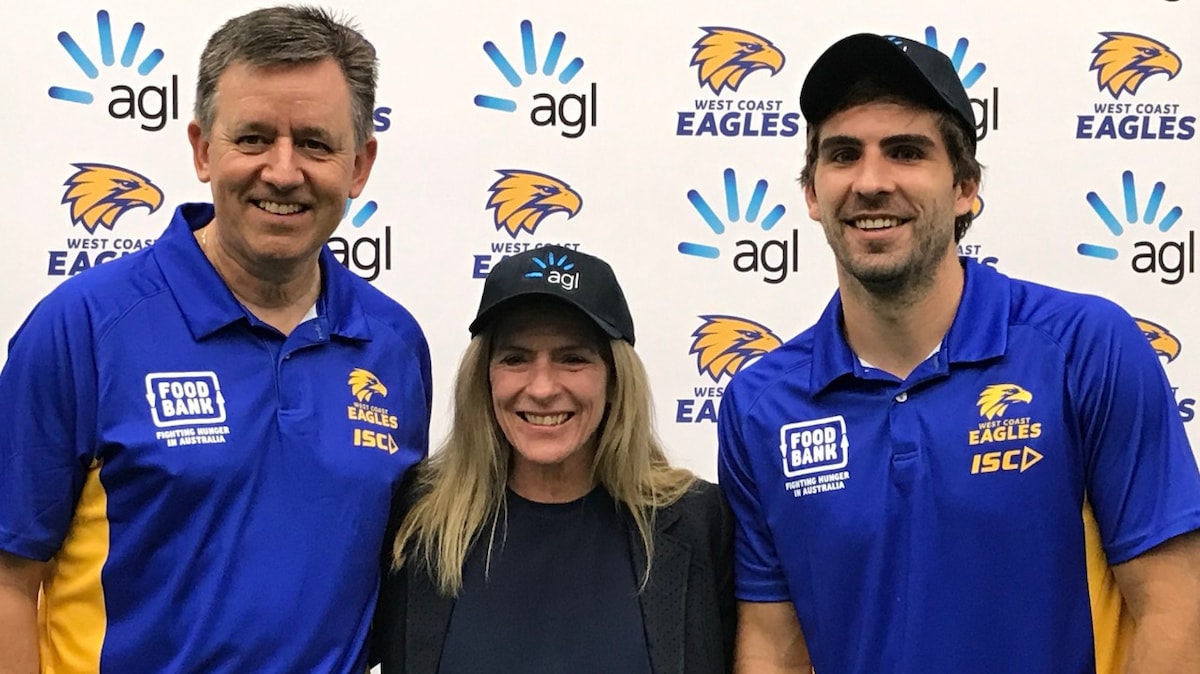 AGL’s Chief Customer Officer, Melissa Reynolds with two West Coast Eagles players