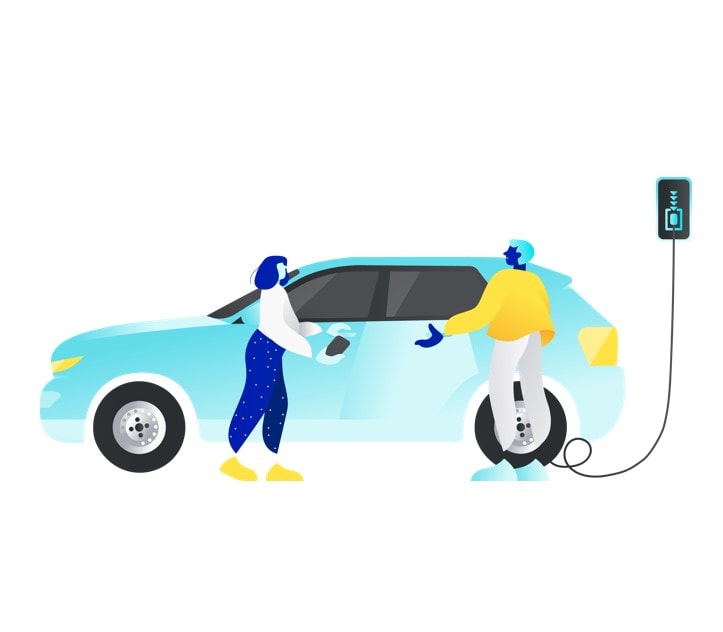 Two people charging an ev