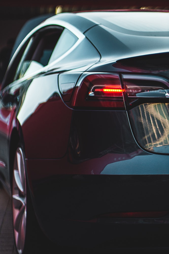 Closeup of the back of a black EV