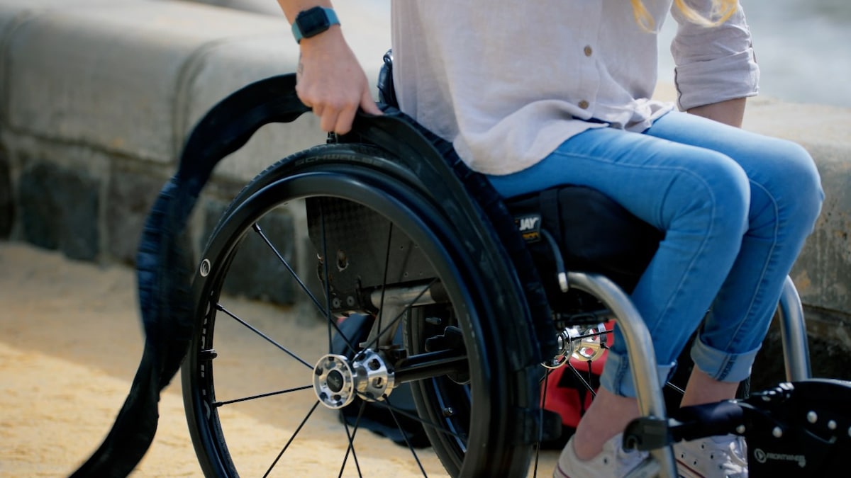 Closeup of woman in wheelchair on the foreshore