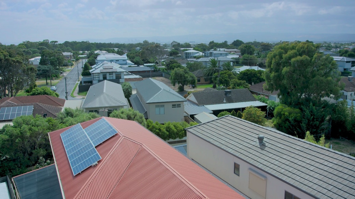 Aerial view of solar panels on houses